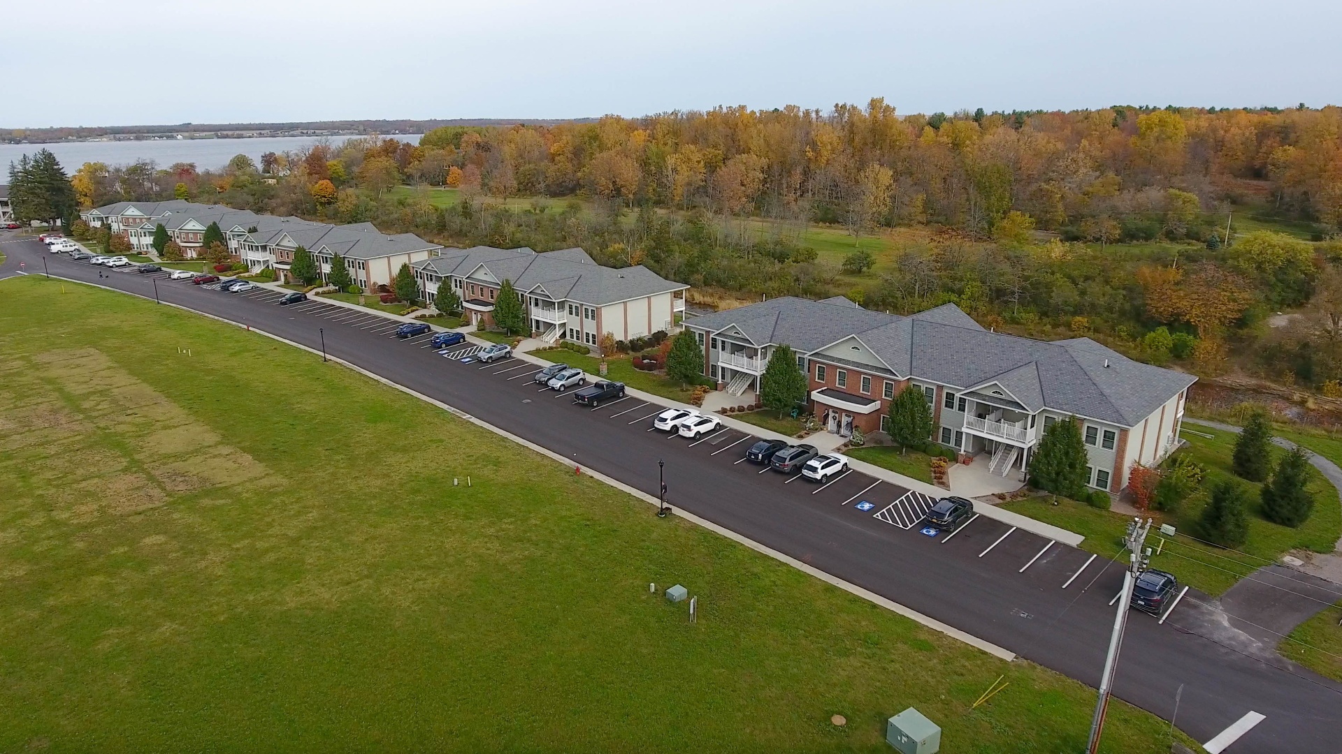 Aerial view of VictoryBase Properties apartment complex showing well-maintained grounds and parking